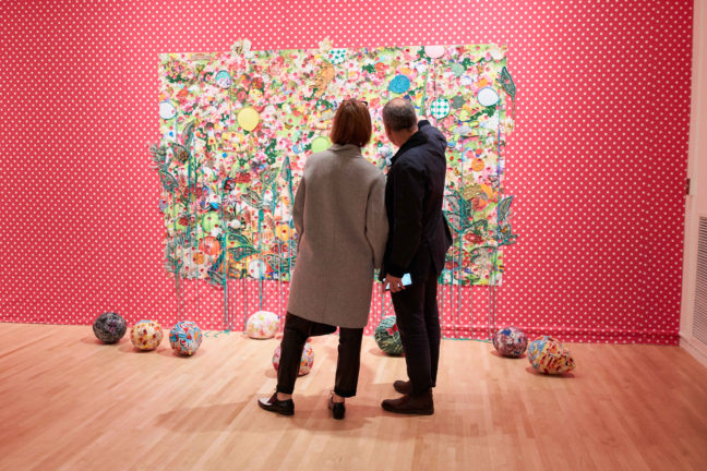<p>Guests view the work of Ebony G. Patterson at the opening of <em>In Plain Sight</em> in November 2019. Photo:&nbsp;Jonathan Vanderweit.</p>

