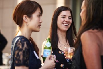 <p>Guests enjoy a recent exhibition preview. Photo: Jonathan Vanderweit.</p>

